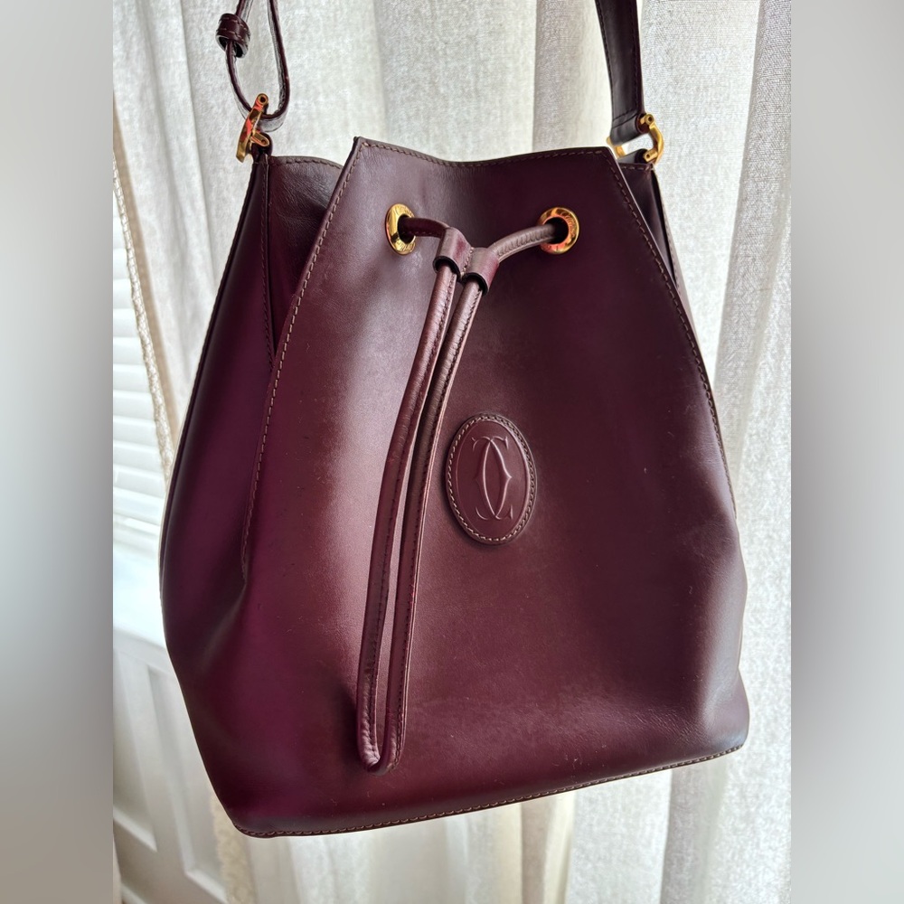 Cartier Vintage classic burgundy shoulder bag.